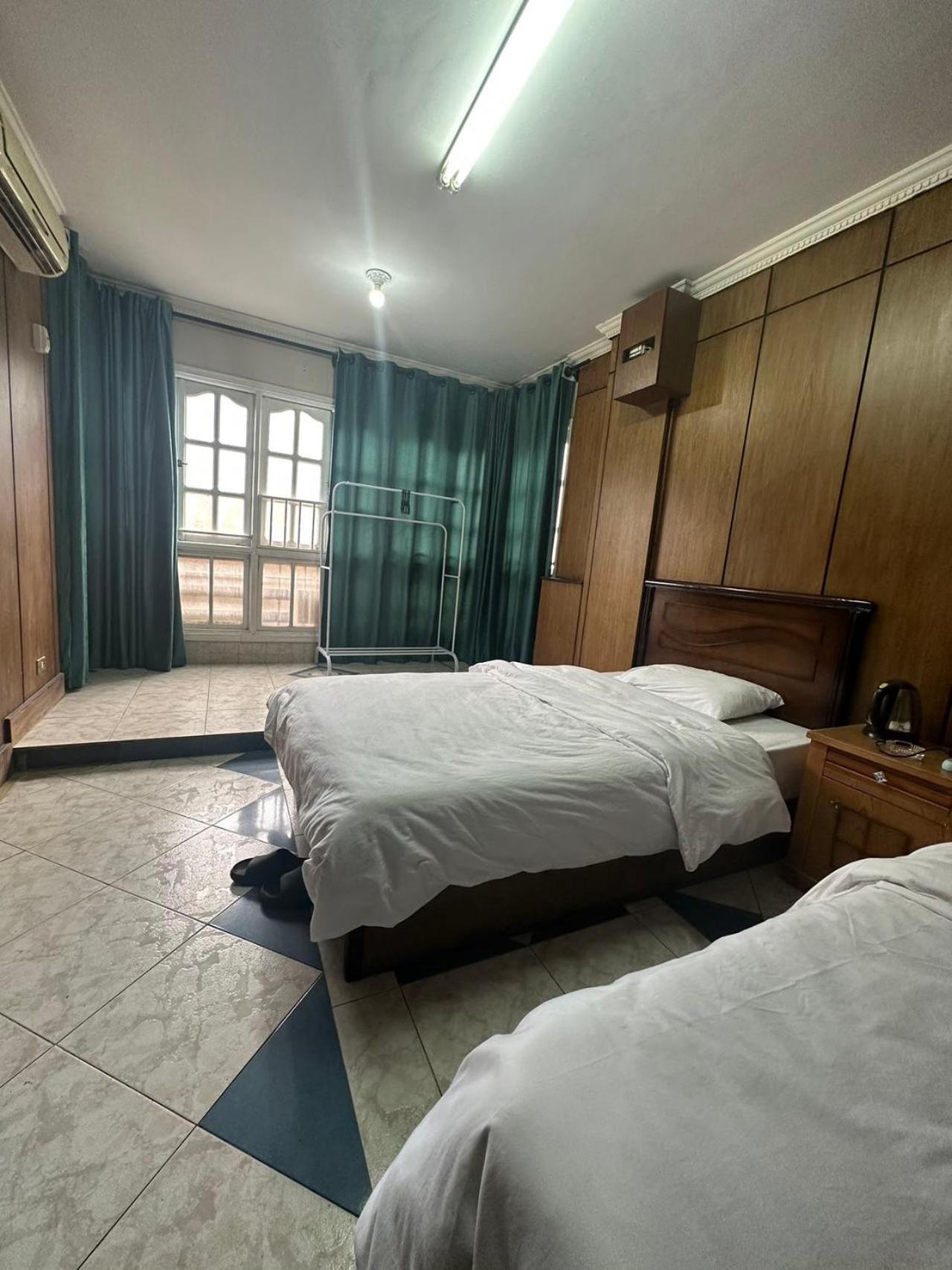 Casa de hóspedes Qinfu Cairo